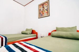 Baliuma Retreats–Shared Balinese Style Homestay Garden Room for 1